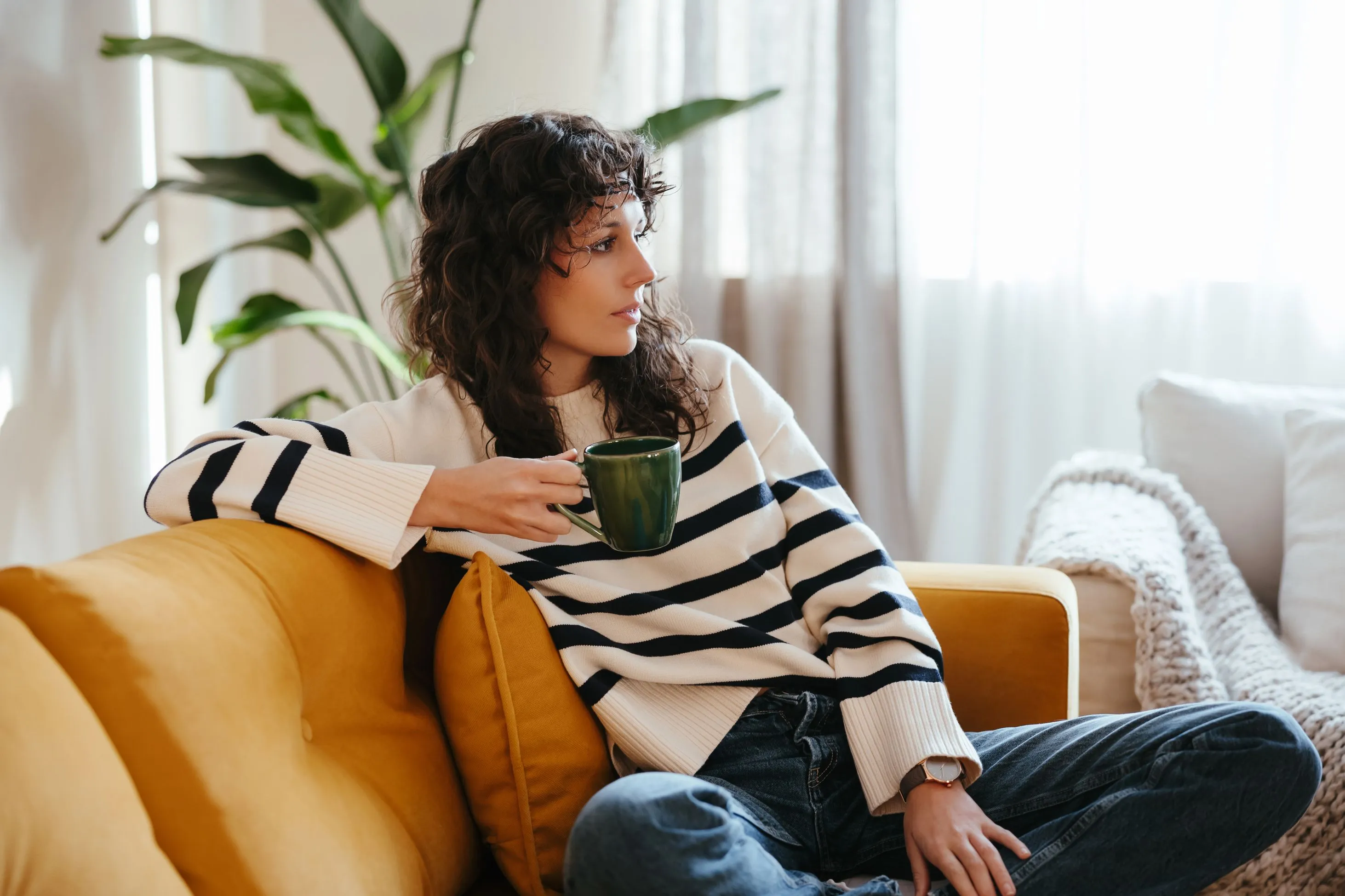 A woman drinking coffee